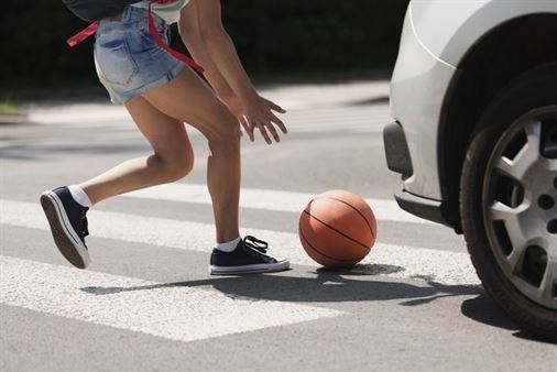 A person running to the side of a basketball

AI-generated content may be incorrect.